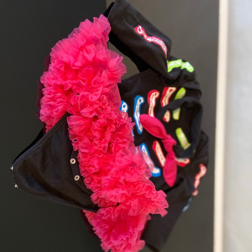 Toddler’s neon skeleton onesie with tutu